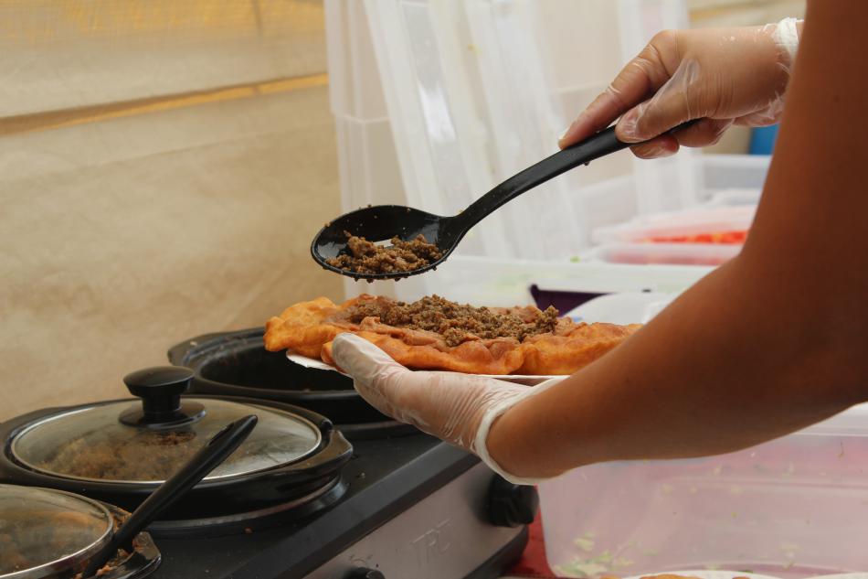 Tacos are topped off with fresh ground beef