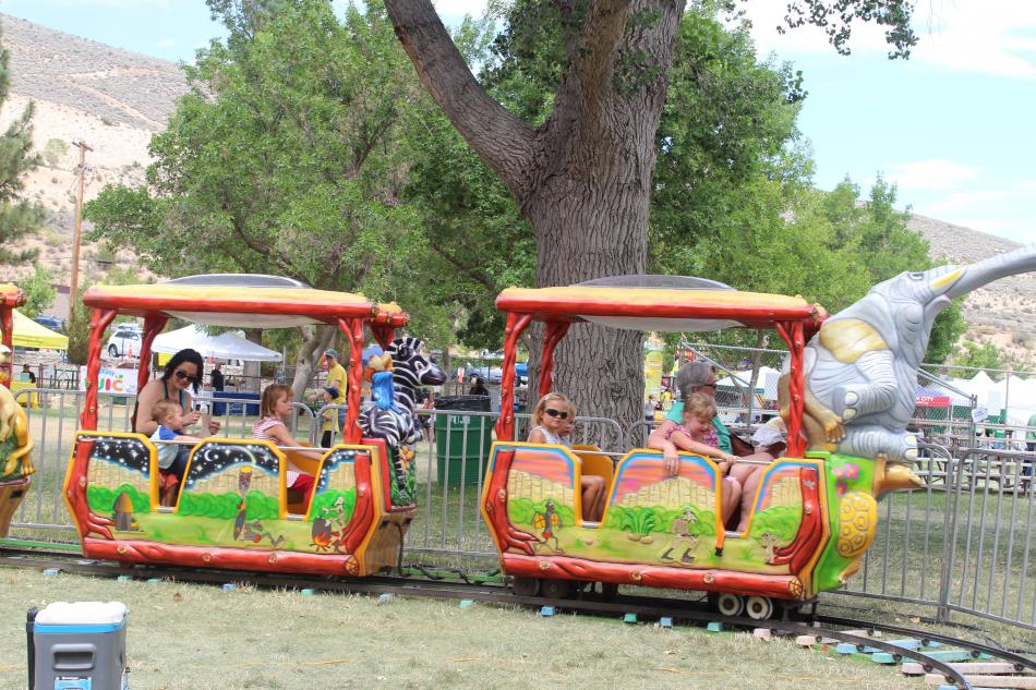 Two families enjoy a short train ride