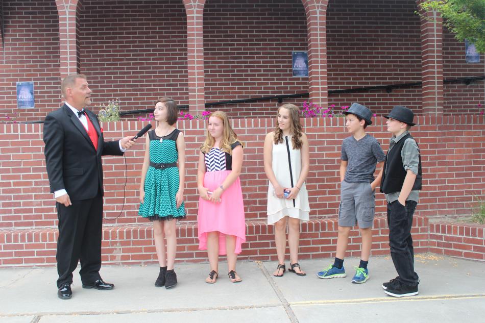 The third group makes their introductions on the red carpet