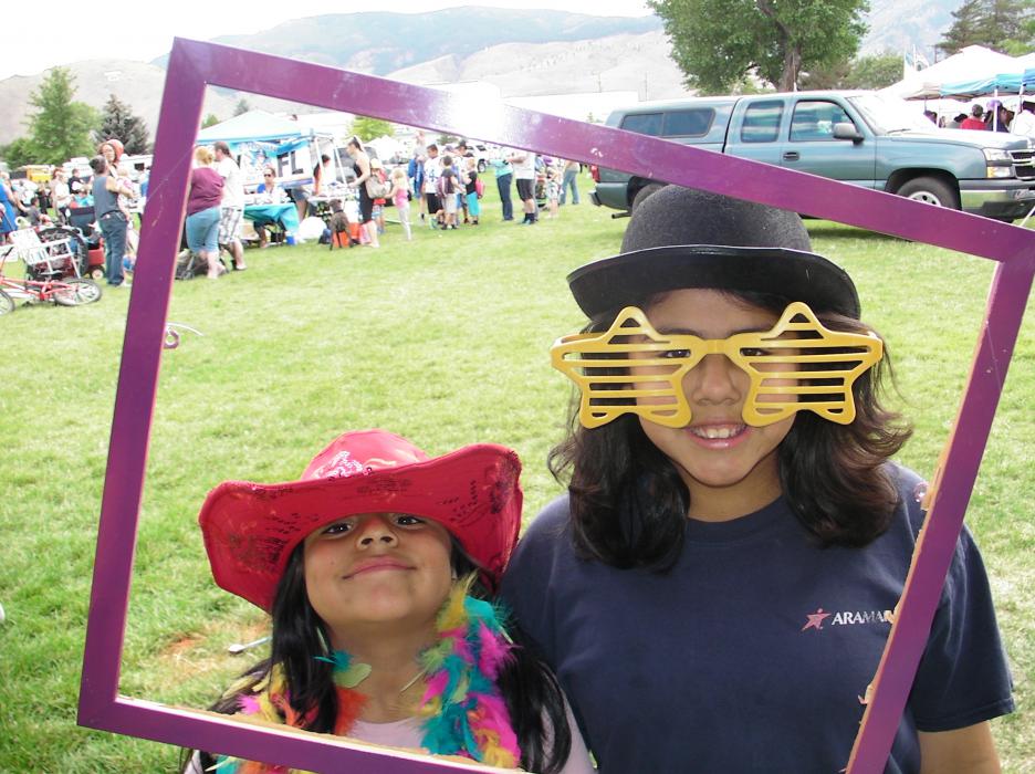 Sisters Ashley and Anageli in the photo frame exhibit.