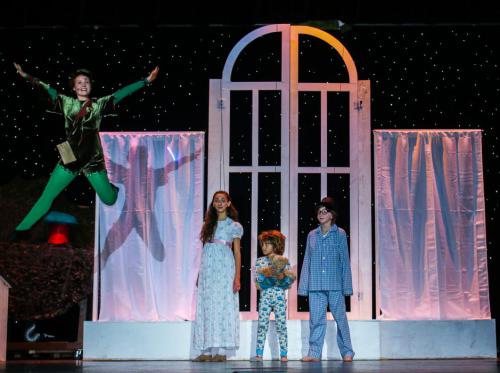 Alexa Haight as Peter Pan, Cassia Giustra as Wendy, Sydney Berg as John, Lily Baum as Michael. Photo by Angila Golik of Golik Ph