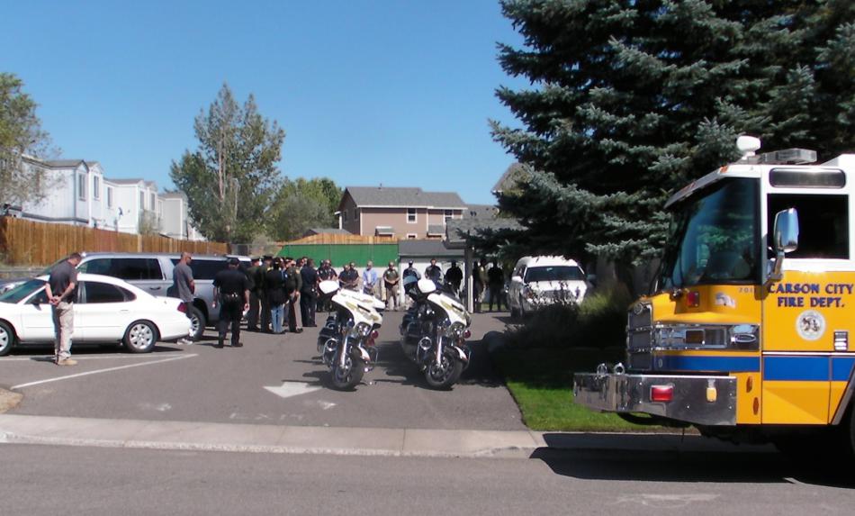 Carson City Deputy Carl Howell's body was taken to FitzHenry's Funeral Home on Monday, led by a procession of law officers.