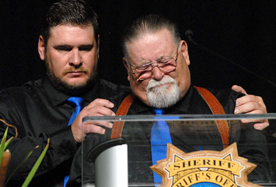 Kevin Howell sheds tears during the funeral service for his son. Marilyn Newton, Nevada Photo Source