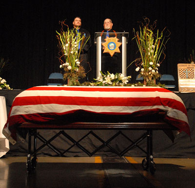 Kevin Howell, with his son, Cory, delivers a eulogy. Marilyn Newton, Nevada Photo Source