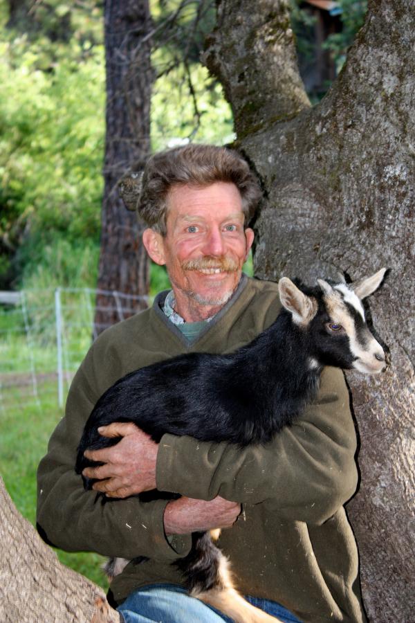 Storyteller Tom Wade and his pet goat.