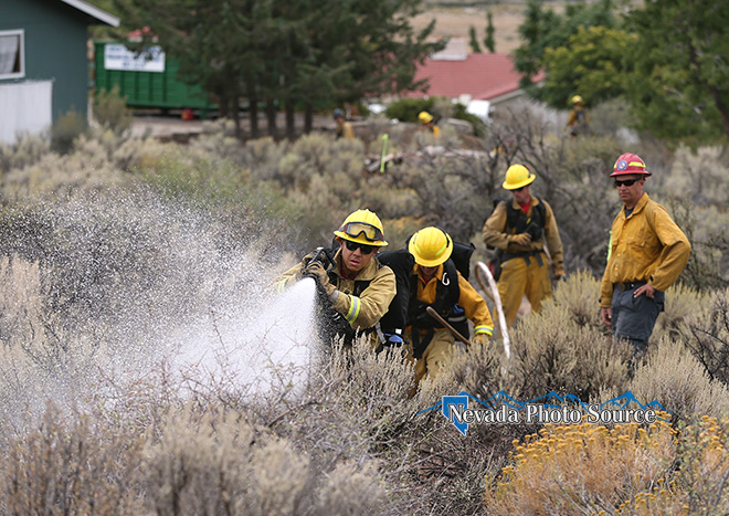 Carson City Fire Capt. Jason Danen, right, conducts wildland training with new recruits. Cathleen Allison, Nevada Photo Source