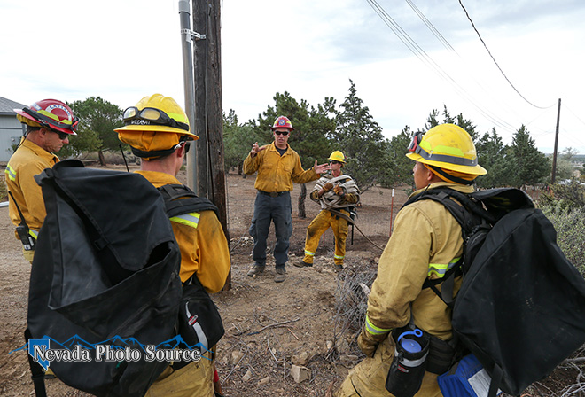 Carson City Fire Capts. Mike Santos, left, and Jason Danen, center, conduct training. Cathleen Allison, Nevada Photo Source