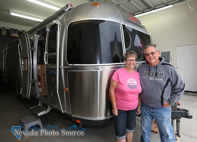 Cecelia and Bob Stansbury pose with their Airstream in Carson City. Photo by Cathleen Allison, Nevada Photo Source