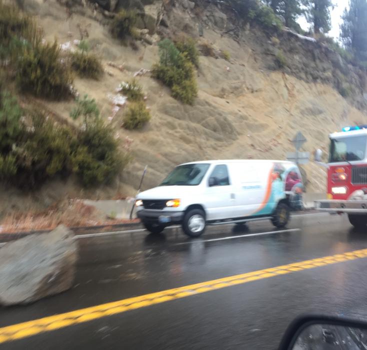 A boulder fell Monday afternoon on Highway 50 near Cave Rock. Photo by David Patterson