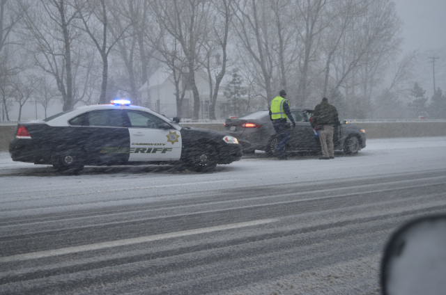 Sheriff's deputies assist a motorist south of Eastlake Blvd on I580  after hitting the center divide