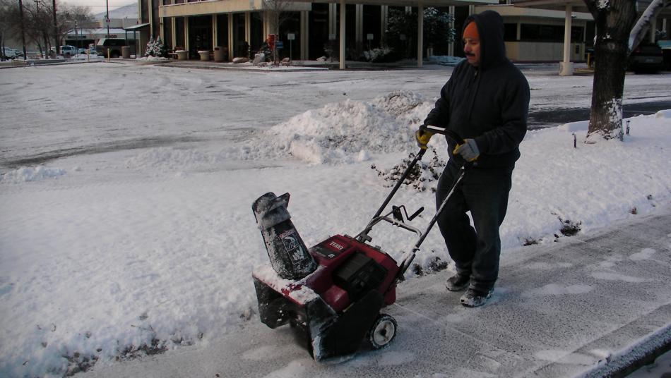 Sidewalks along streets saw snowblowers Monday morning.