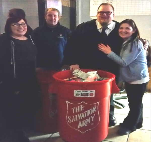 L to R: Shania Adams, Steve Hughes, of the Salvation Army, Lt. Mark Cyr and Danielle Erickson, a patron of MJ's.