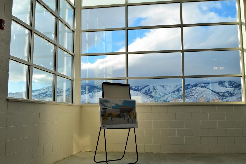 Architectural rendering of the MAC in the foreground of a majestic Carson City mountain view