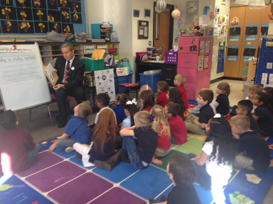 Mayor of Carson City reading to the class