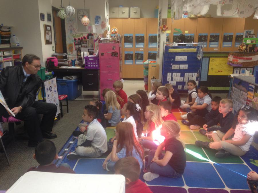 Superintendent of Carson City Schools, Richard Stokes, reading to Mrs. Cacioppo's kindergarten class