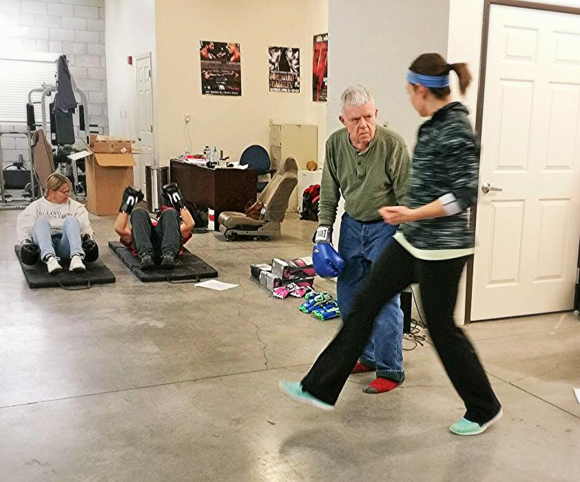 Photo courtesy Tazmanian Boxing Club, where physical therapist Nina Vogel is shown working with a client.