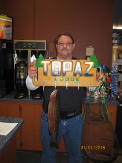 Douglas Cunningham celebrates his Topaz Lake catches.