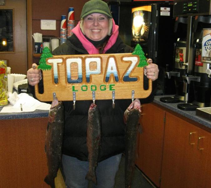 Keri Capps with the fish she caught opening day at Topaz Lake.