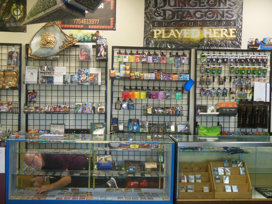 Co-owner Jim Williamson works below the front counter at Nerdvana.