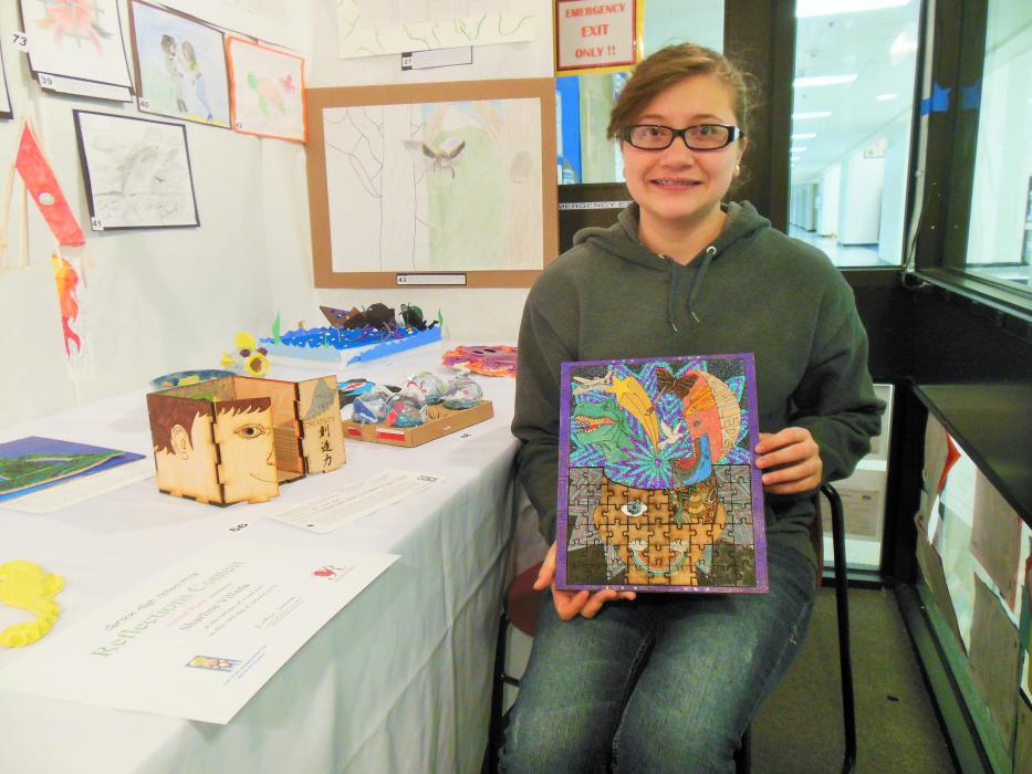 Visual Arts finalist Sharline Villeda with her second place entry entitled 