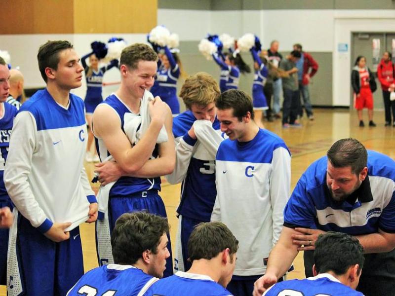 Senators huddle in a game against Wooster on Jan. 15. Photo courtesy Jenn Minifie, CHS Boys Basketball