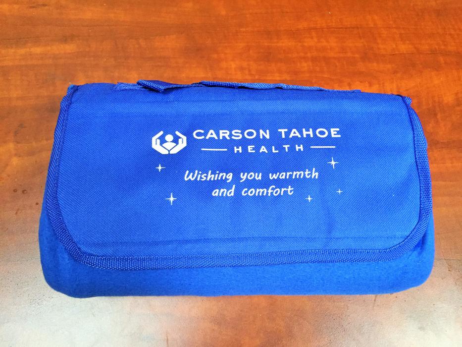 Photo courtesy Nevada DCFS. Emergency blanket tote donated by Carson-Tahoe Health.