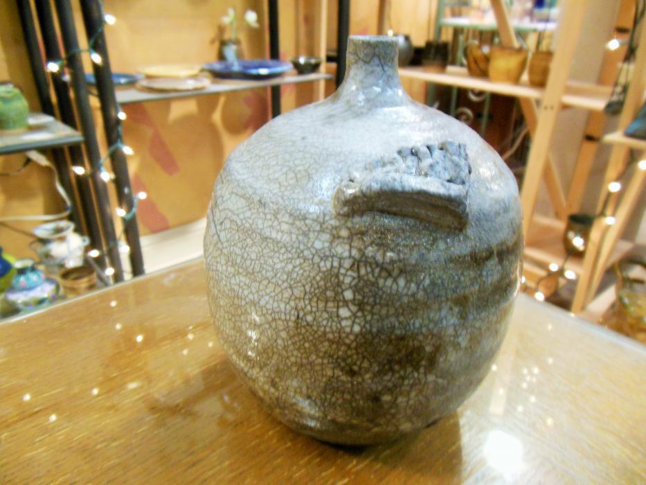 Finished pottery art by Robin McGregor, featuring her artist signature.