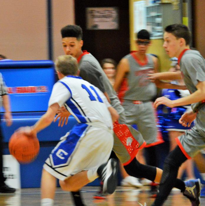 Taylor Saarem (11) dribbles down the lane against Wooster Tuesday night at CHS.