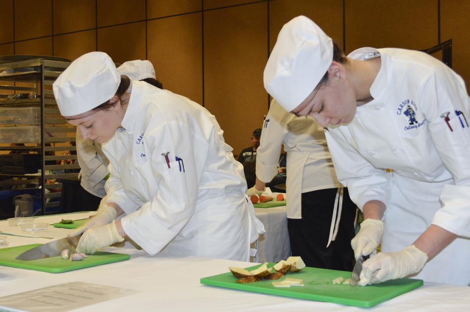 Culinary arts student practice with the knives.