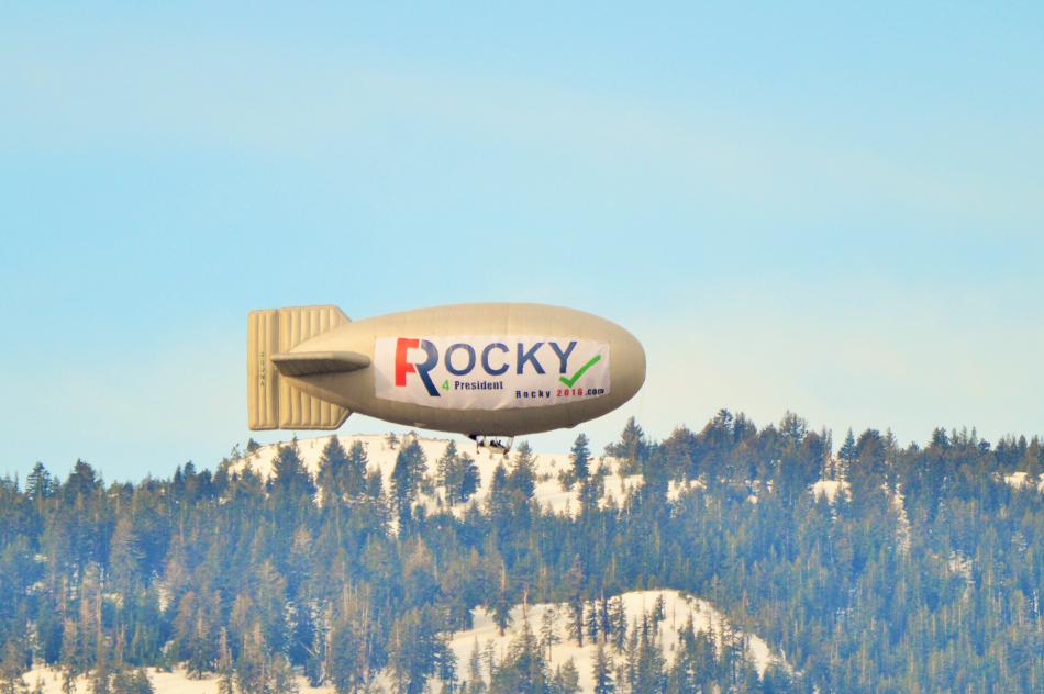 A blimp bearing a political presidential banner floats above Carson City Sunday morning.