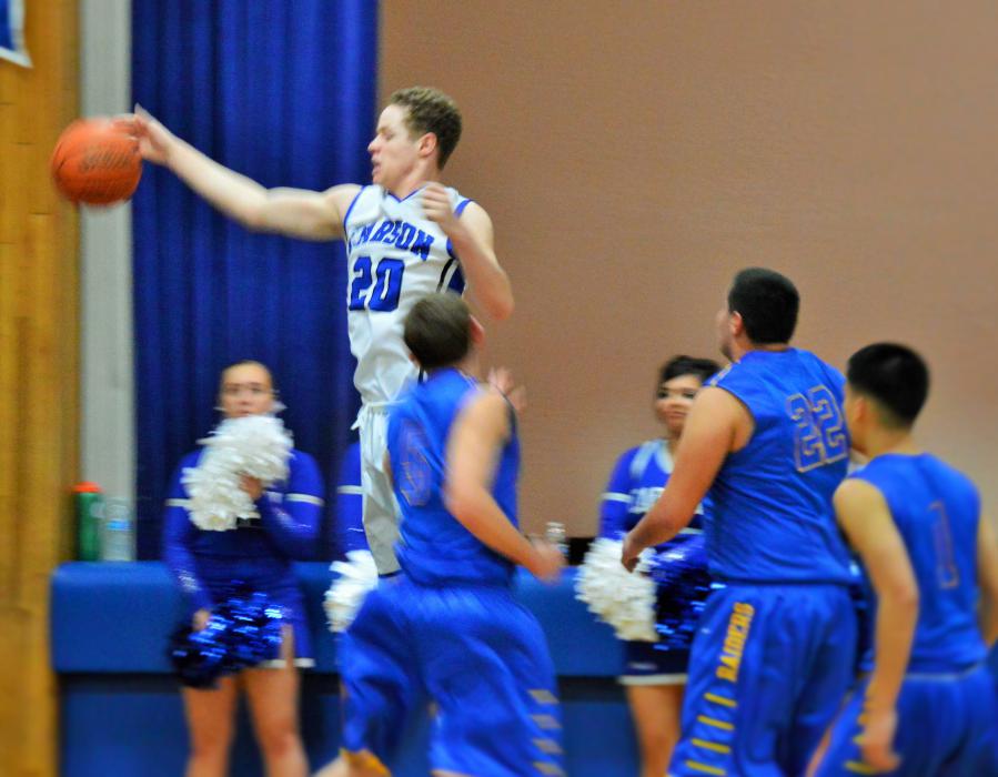 Tez Allen saves the ball from going out of bounds Wednesday night at CHS.