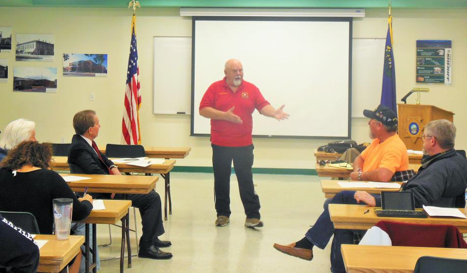 Frank Reynolds, President of the Vietnam Veterans of America Chapter 388 in Carson City addresses the green zone panel Wednesday