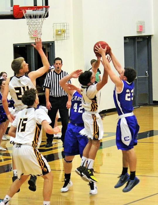 Photo courtesy Jenn Minifie, CHS. Cody Azevedo fights for a rebound against Galena in a game earlier this month.