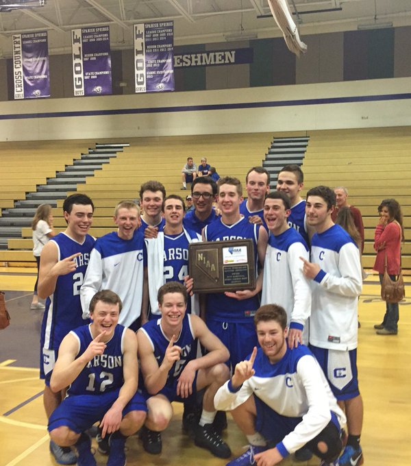 Photo courtesy Carson Hoops. CHS boys varsity basketball team poses with its regional trophy.