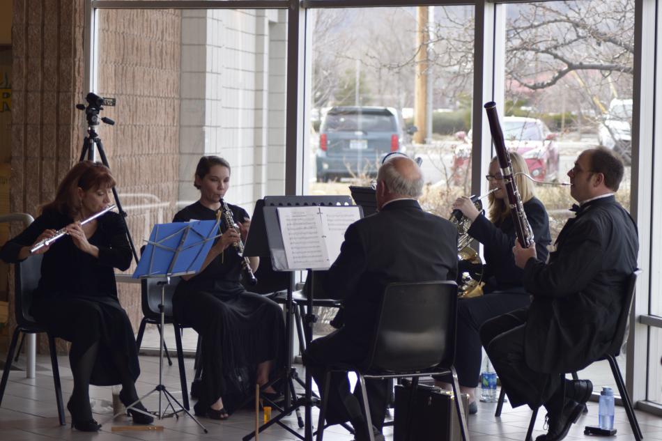 Symphony woodwind quintet entertains attendees before the concert