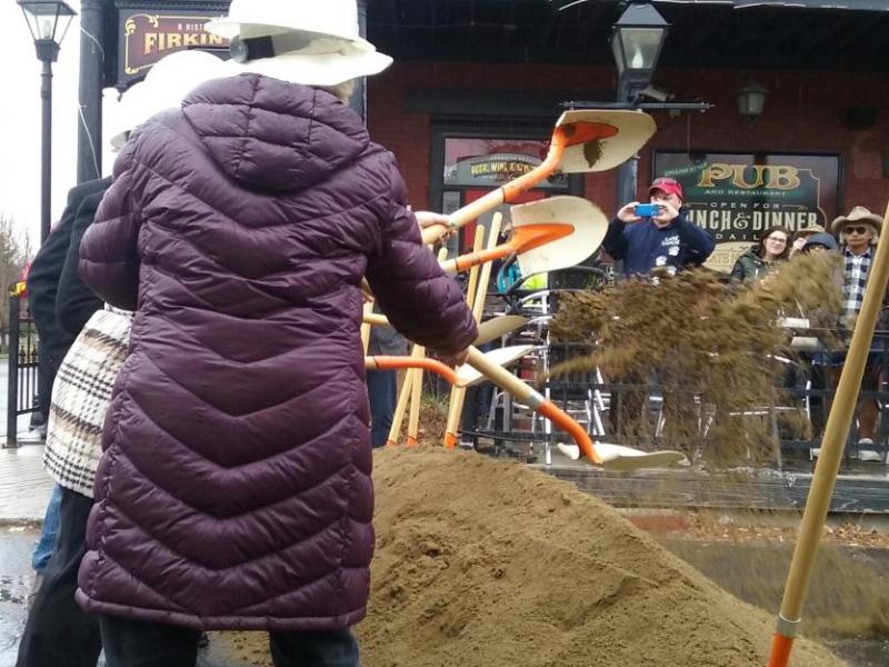 Members of the Carson City Board of Supervisors break ground by tossing dirt onto Third Street Monday morning.
