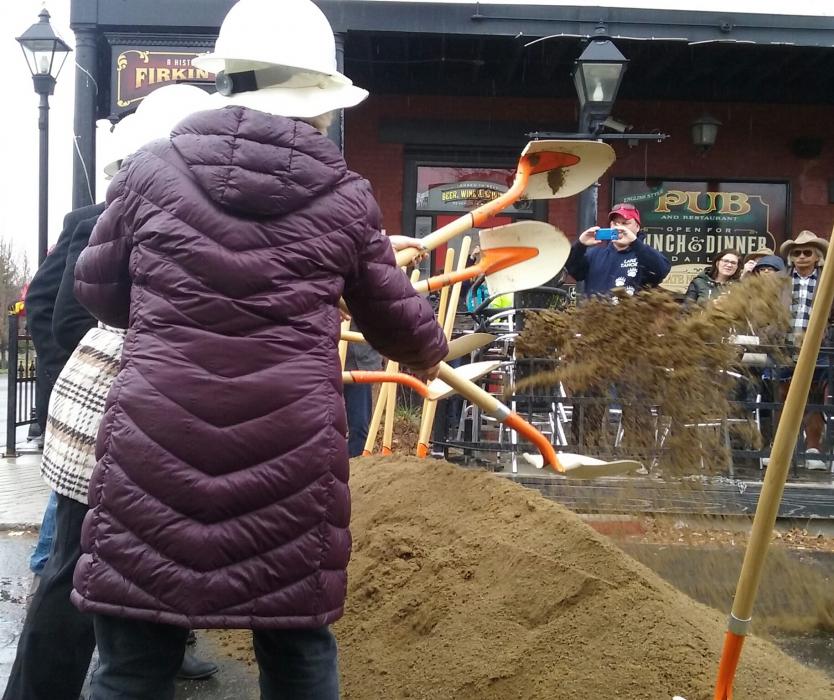 Members of the Carson City Board of Supervisors break ground by tossing dirt onto Third Street Monday morning.