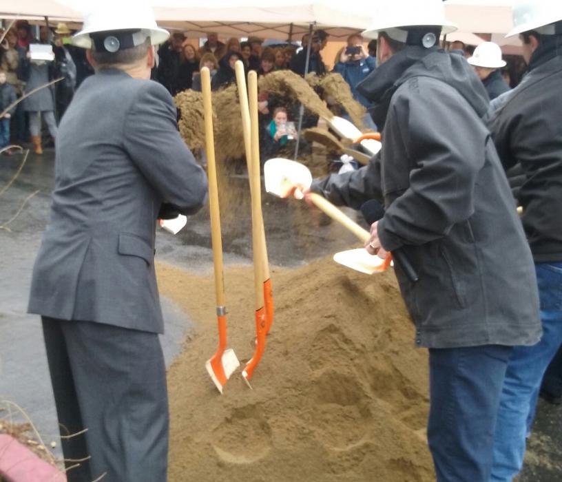 Carson City Manager Nick Marano (far left) participates in the ground breaking Monday morning along Third Street.