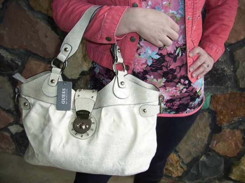 For each dollar contribution donors will be entered into a raffle to win this beautiful, brand-new GUESS purse.