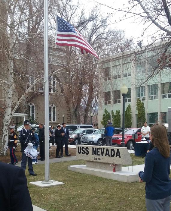 Ceremony commemorating the U.S.S. Nevada commission plaque behind the State Capitol.