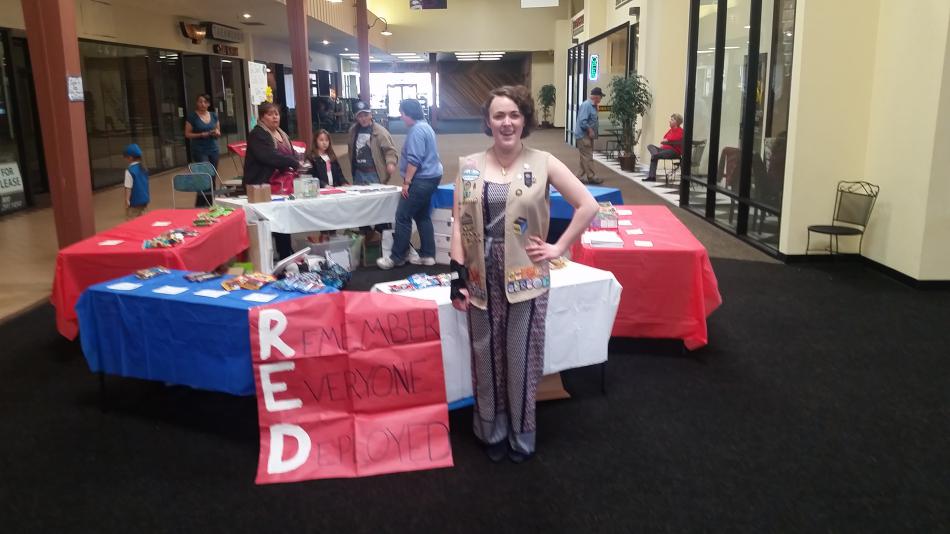 Delaney Mott stands in front of her booth at the Carson Mall