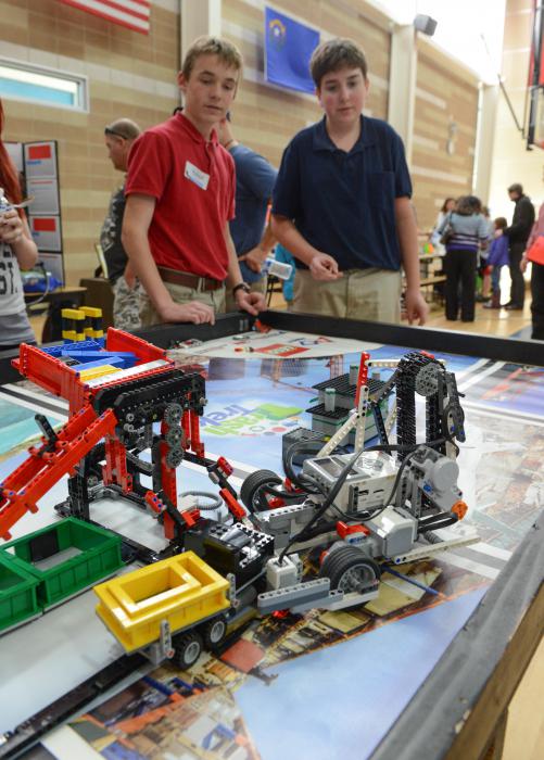 Cash Farnworth, left, and Devon Defilippi watch their Lego EV3 tractor during Eagle Valley's STEM Night. Photo by Tim Dunn