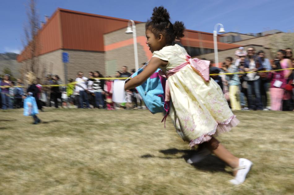 Amethyst Olivas, 4, of Carson City races for eggs during the 7th Annual Easter Fiesta held Saturday at Western Nevada College.