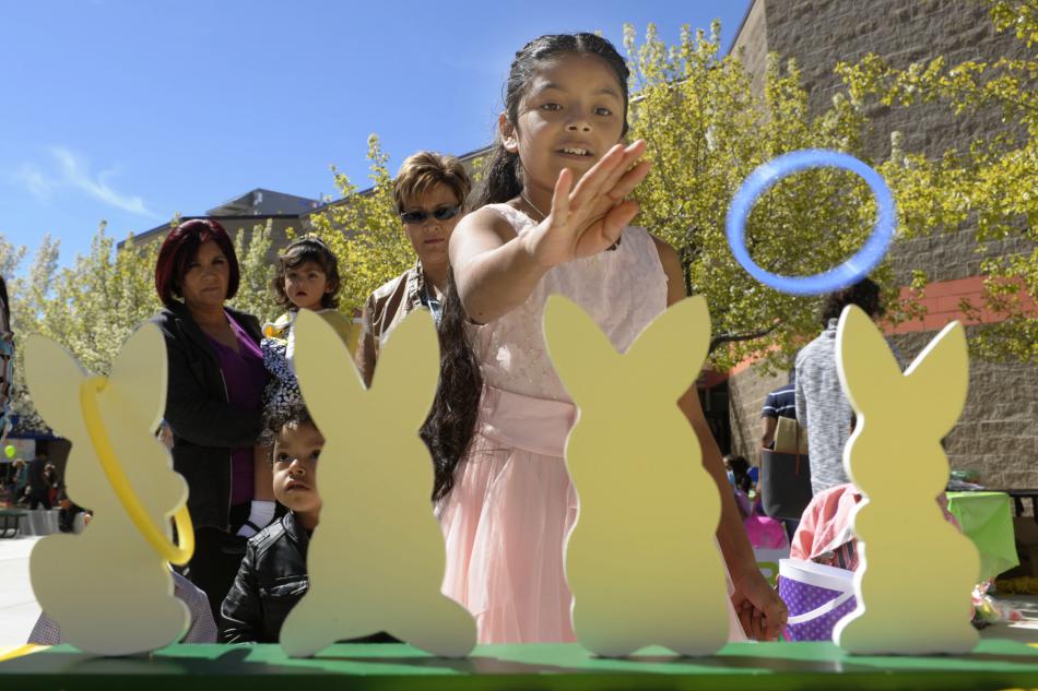 Alexandra Llamos, 10, Carson City, wins the ring toss during the 7th Annual Easter Fiesta at WNC.