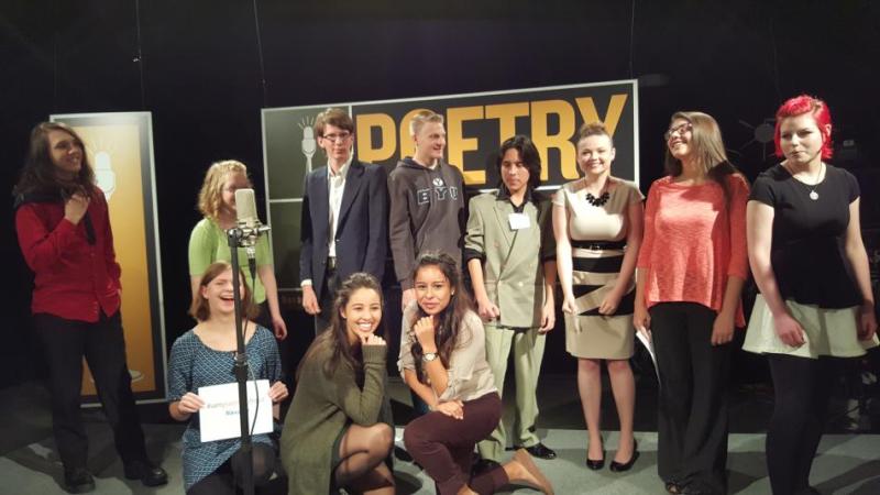 Shaylin Segura is featured in the bottom center of this photo at the Poetry Out Loud competition.