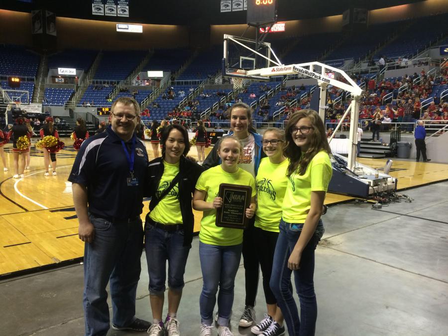 Athletic Director and Girls Varsity Coach Michael Nelson accepting the Academic 