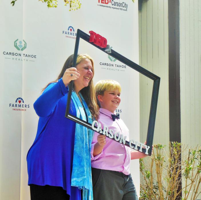 Dr. Rebecca Bevans poses for a picture with her son, Alexander, Friday at the Brewery Arts Center.