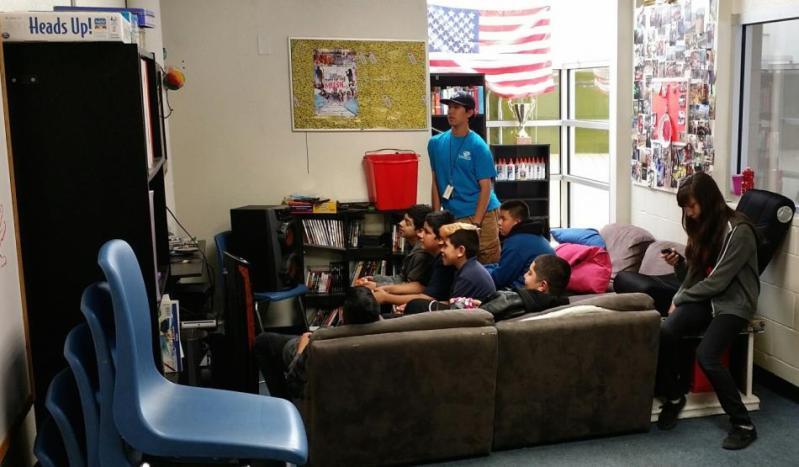 Julian Alvarado, standing, works with area teens at the Boys & Girls Clubs of Western Nevada’s current Teen Center.