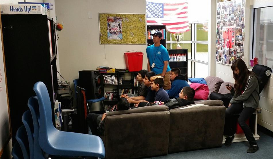 Julian Alvarado, standing, works with area teens at the Boys & Girls Clubs of Western Nevada’s current Teen Center.