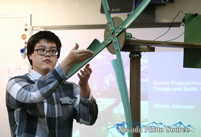 Shane Johnson explains how he created a windmill as his CHS senior project. Cathleen Allison, Nevada Photo Source